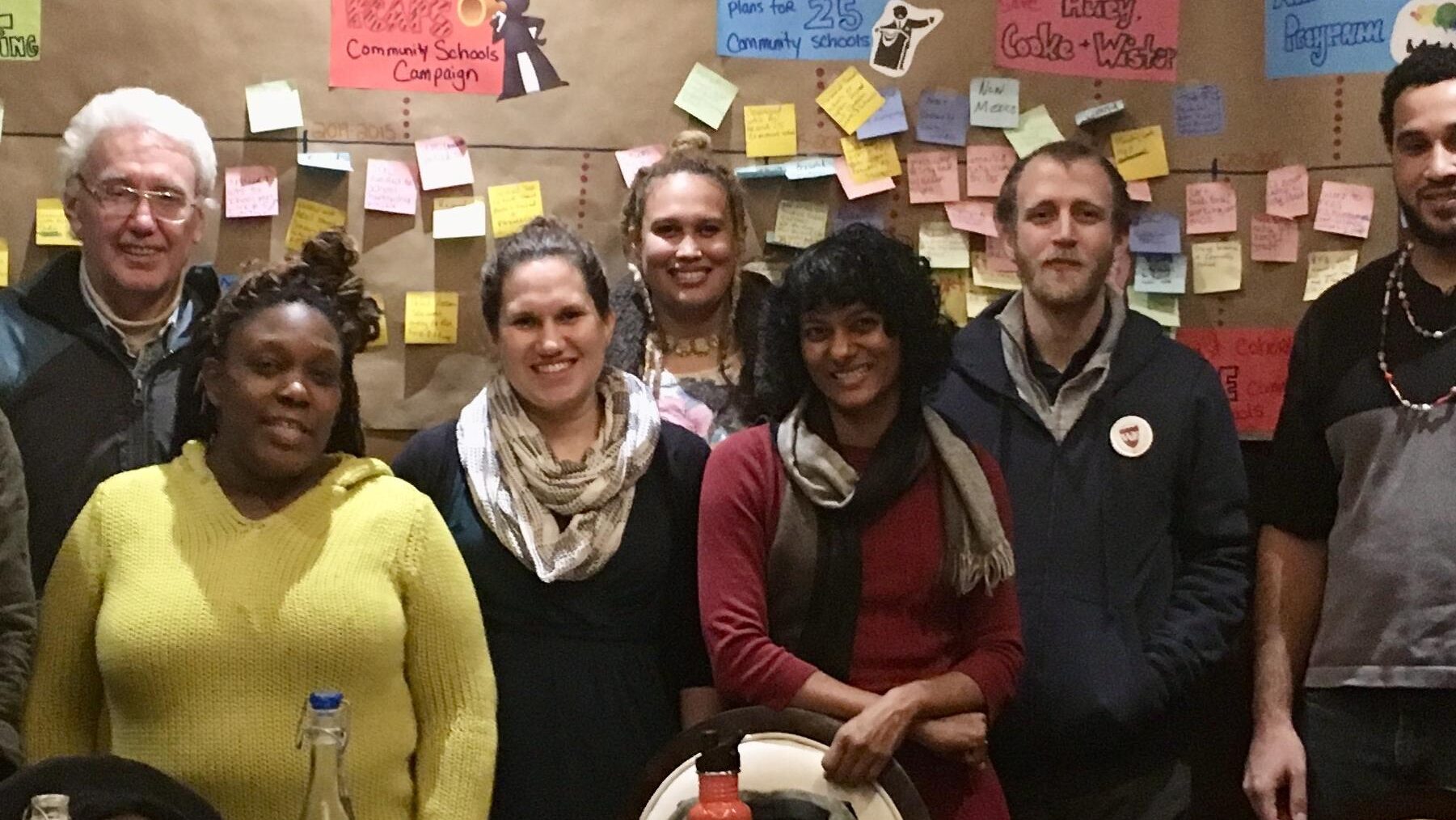 Pep Marie, Shivaani Selvaraj and Kristen Goessling attend a community dinner in 2017 to celebrate the start of a timeline for organizing community schools in Philadelphia.